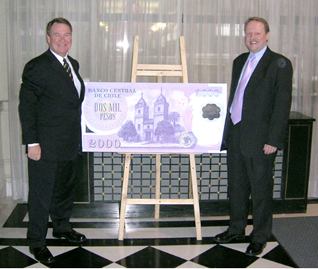 Photograph showing Chris Ogilvy, Chief Executive of Note Printing Australia, and Myles Curtis, Managing Director of Securency Pty Ltd, at the launch of the 2,000 peso polymer note in Santiago, Chile in September 2004.