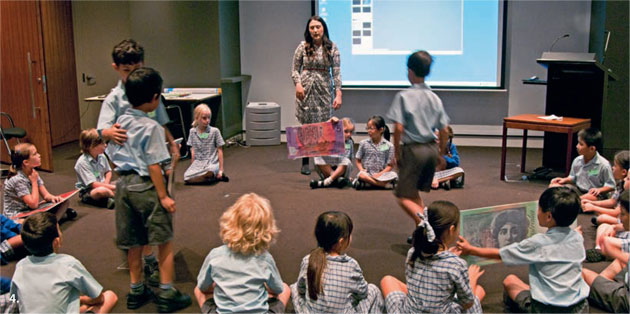 Antoinette Perri (Note Issue Department) showed some giant-sized copies of banknotes to Year 2 students from Beecroft Primary School during their visit to the RBA in March 2012