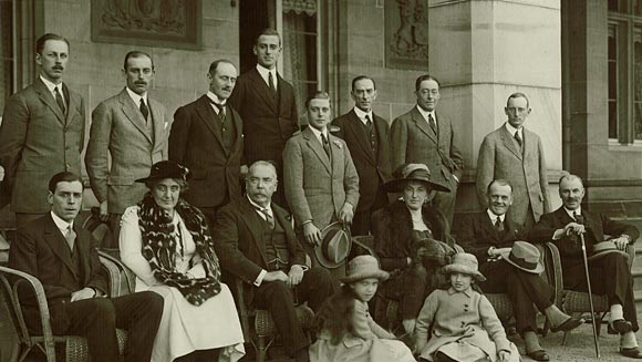 Photograph showing the Prince of Wales (standing in the centre holding his hat) including Sir Walter Davidson, Governor, New South Wales (seated to the left of the Prince of Wales) and the Governor's wife, Dame Margaret Davidson (seated to the right of the Prince of Wales).