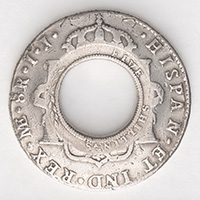 6. A five shillings or ‘holey dollar’ coin created in 1813.