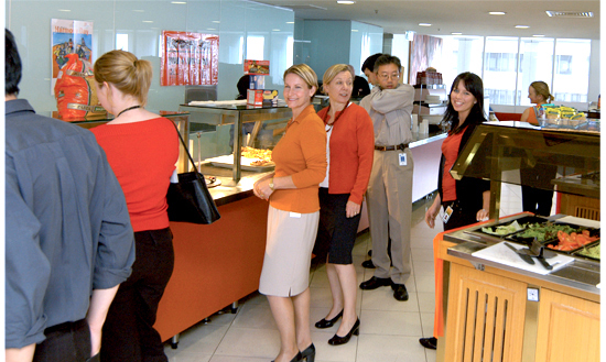 Photograph showing some staff in Cafetaria on Harmony Day