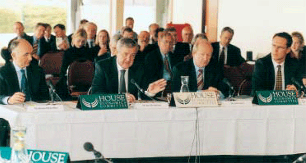 At the Hearing of the House of Representatives Standing Committee on Economics, Finance and Public Administration, in Warrnambool, Victoria, in December 2002: from left, Ric Battellino, Assistant Governor (Financial Markets); Ian Macfarlane, Governor; John Laker, Assistant Governor (Financial System); and Guy Debelle, Head of Economic Analysis.